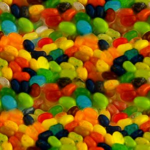 Click to get the codes for this image. Seamless Jelly Beans, Candy Background Wallpaper Image or texture free for any profile, webpage, phone, or desktop