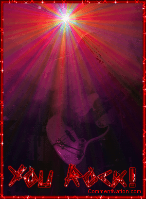Click to get the codes for this image. This glitter graphic features a guitar player on a dark stage with a bright glittered spotlight in the background. The comment reads: You Rock!